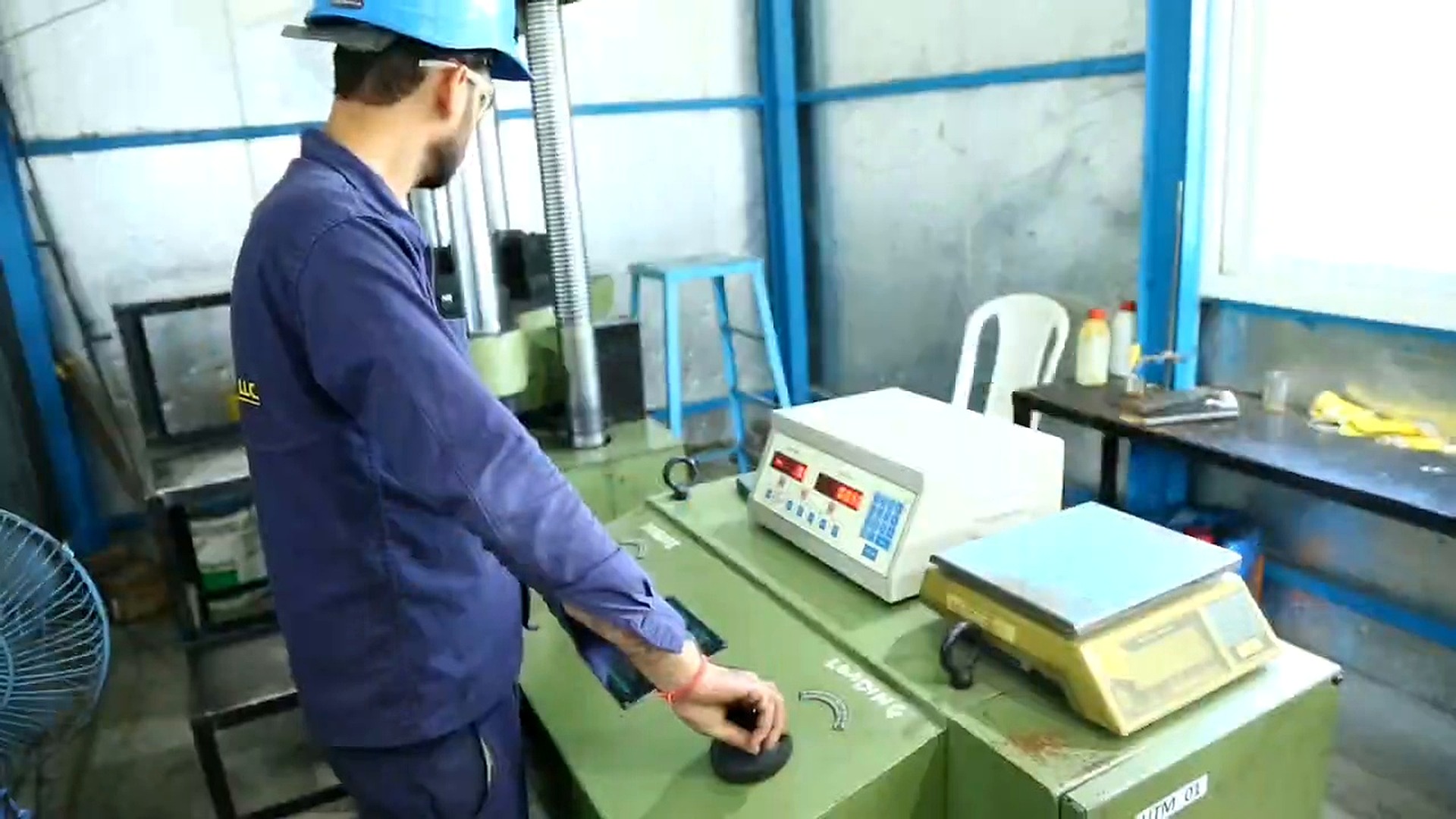 East Steel technician performing laboratory material testing
